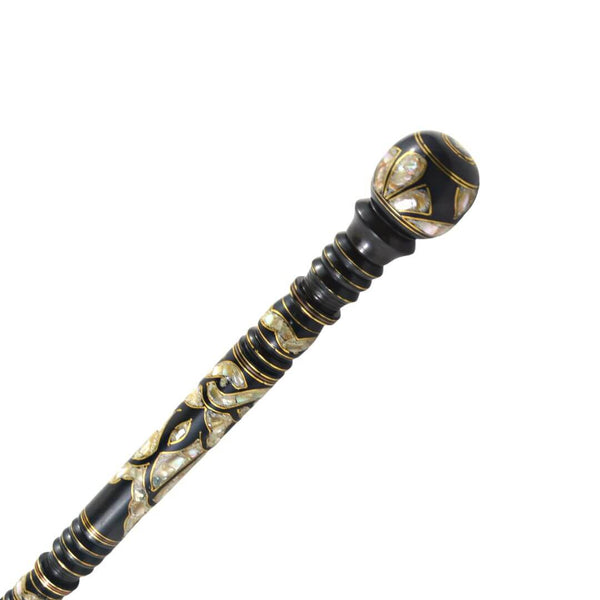 A royal crutch made of ebony wood inlaid with mother-of-pearl and copper
