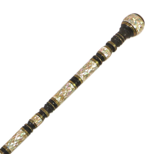 A luxurious crutch made of ebony wood, completely inlaid with natural seashells