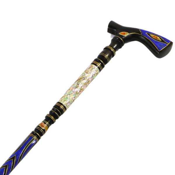 A luxurious crutch made of ebony wood and inlaid with natural mother-of-pearl, copper chains and precious stones