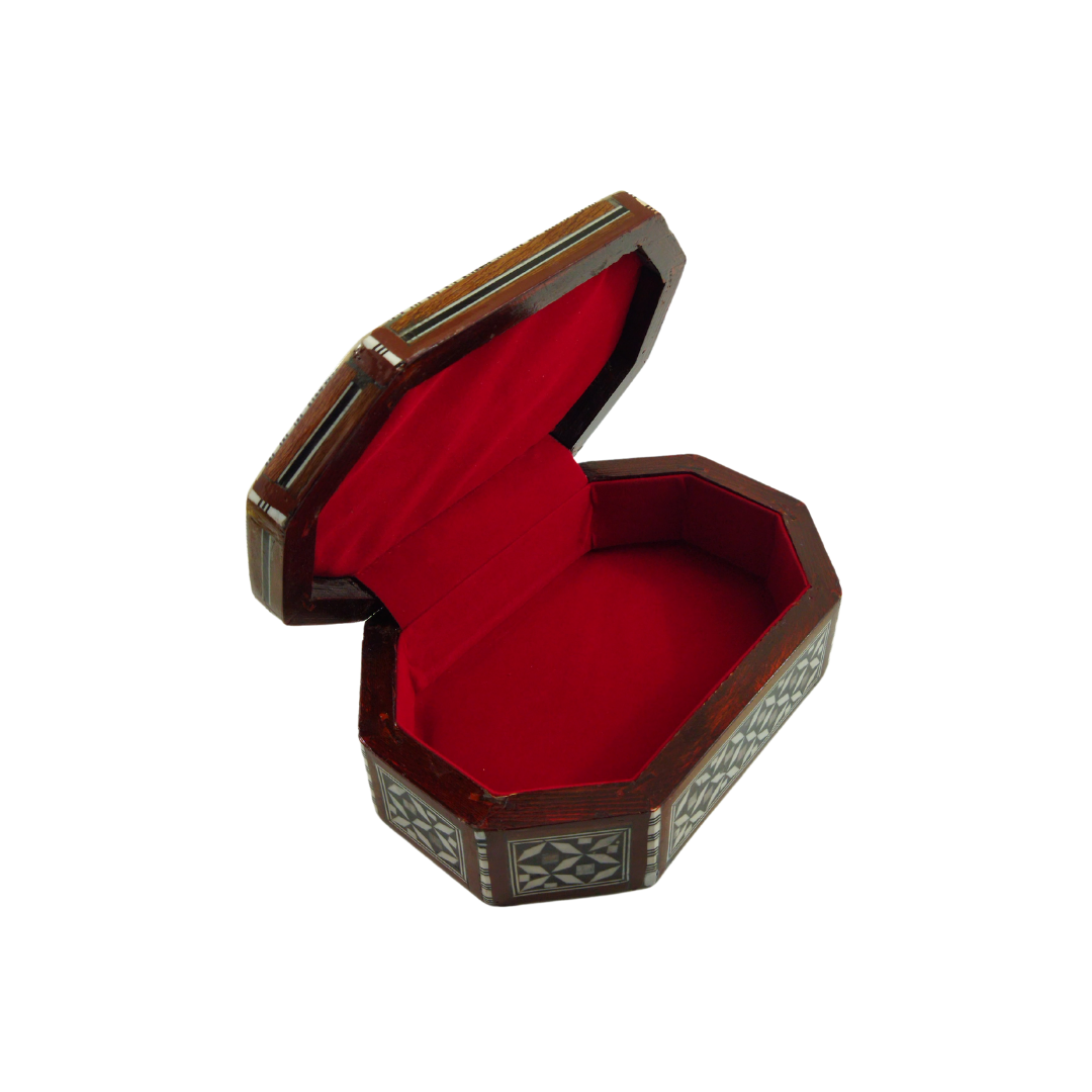 Wooden box inlaid with natural shells in several colors – hexagonal shape padded inside with red velvet Islamic motifs with elaborate details elegant heritage
